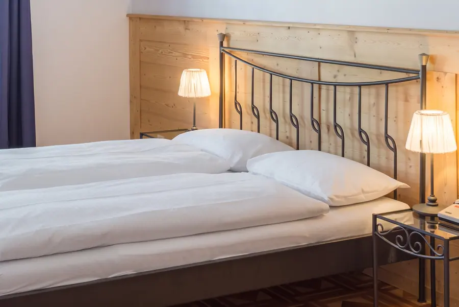 Bett in einem Superior-Zimmer
